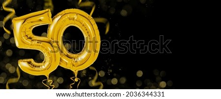 Golden balloons with copy space - Number 50 Royalty-Free Stock Photo #2036344331