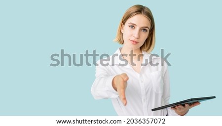 Business meeting. Female representative. Official greeting. Advertising banner. Elegant woman proposing handshake clipboard in hand isolated blue copy space wide ledge.