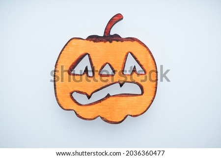 Close-up of childrens handicrafts for Halloween. Helloyin Symbols - Jack Lantern, Pumpkin, Spider