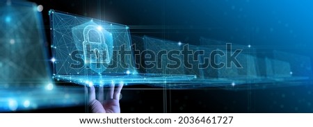 Hand show virtual laptop computer with CYBER SECURITY Business technology Cyber Security Firewall  and Antivirus Alert Protection Security with Cybersecurity and information technology. Royalty-Free Stock Photo #2036461727