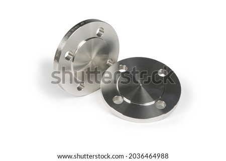 Blind flanges, set of steel welding fittings. Royalty-Free Stock Photo #2036464988