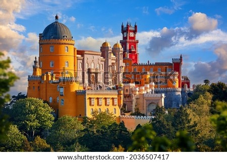 Palace of Pena in Sintra. Lisbon, Portugal. Famous landmark. Summer morning landscape with blue sky. Royalty-Free Stock Photo #2036507417