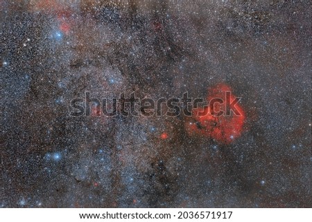 Space nebula in the constellation Cassiopeia. Photo of real space. Blue stars, cosmic clouds.
