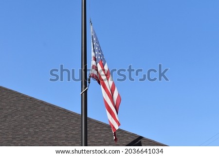 American flag lowered to half-staff