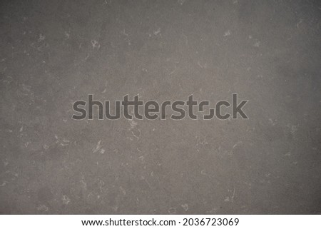 Flatlay of granite black stone surface for product and package background advertisment.
