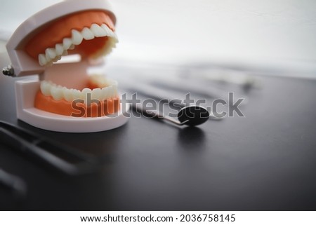 Equipment for the dental office. Orthopedic Instruments. Dental technician with work tools. Dentist metal tools. Royalty-Free Stock Photo #2036758145