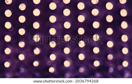 Purple and gold holiday abstract background.