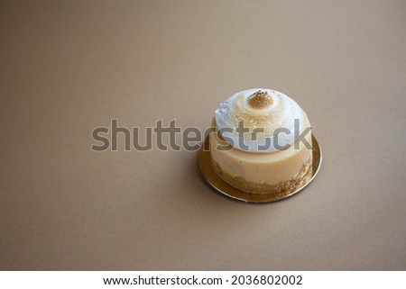 lemon cake with cream, coffee cup