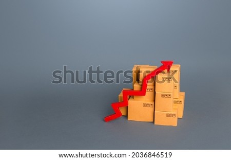 Boxes with goods and a red up arrow. Revenue growth in trade and transportation industry. Rise of the national economy, trade balance. Industrial production increase. Import export. Taxes and duties.