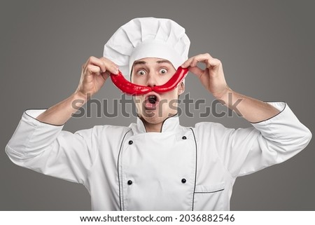 Funny cook with red peppers