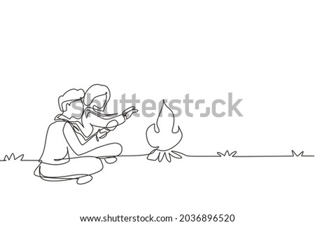 Single continuous line drawing romantic couple camping around campfire tents. Man woman warm their hands near bonfire sitting on ground. Nature trip. One line draw graphic design vector illustration