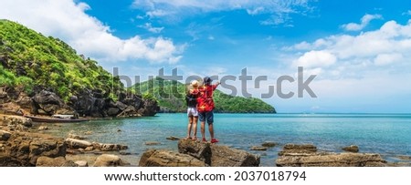 Wide panorama happy couple traveler on beach joy fun nature view scenic landscape island, Adventure attraction tourist travel Thailand summer holiday vacation trip, Tourism beautiful destination Asia Royalty-Free Stock Photo #2037018794