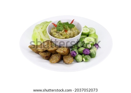 Sai Aua or Northern Thai Spicy Sausage with Nam Pig Num or Chili Sauce and vegetables isolated on white background