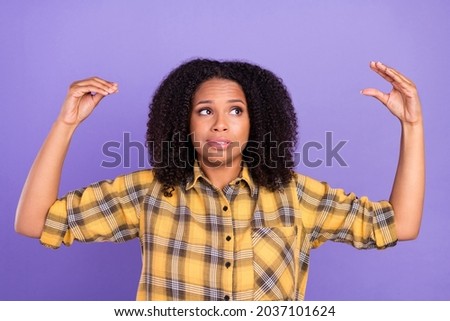 Photo of nervous lady make gesture talking hands look up wear checkered shirt isolated violet color background