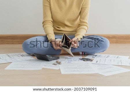 Stressed, Problem business person woman holding and open empty wallet, purse no have money for bill payment, credit card loan or expense. Bankruptcy, bankrupt or debt financial, mortgage concept. Royalty-Free Stock Photo #2037109091