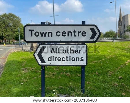 Two signposts in different directions