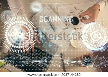 Double exposure of man's hands typing over computer keyboard and data theme hologram drawing. Top view. Technology concept.