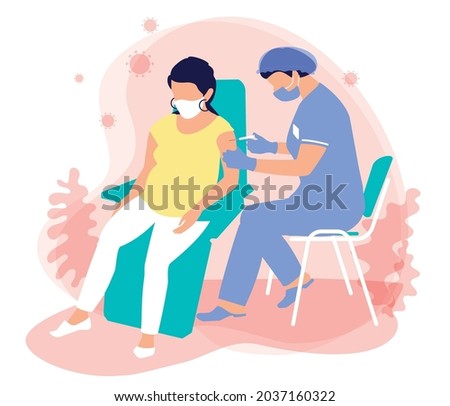 A masked nurse in a medical suit, gloves, mask gives an injection of a vaccination for immunization coronavirus to a pregnant woman. Protection the spread of covid 19. The use of vaccines for pregnant Royalty-Free Stock Photo #2037160322