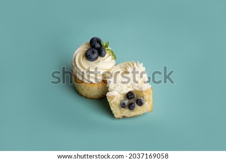Delicious confectionery products on a blue background. Desserts for coffee and tea. Home bakery.