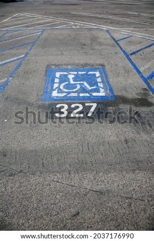 Handicap Parking Space. Handicap parking space with space number to pay for parking. 