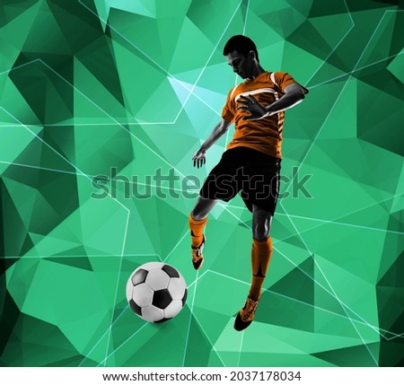 Dribbling the ball. Young man, male football soccer player training