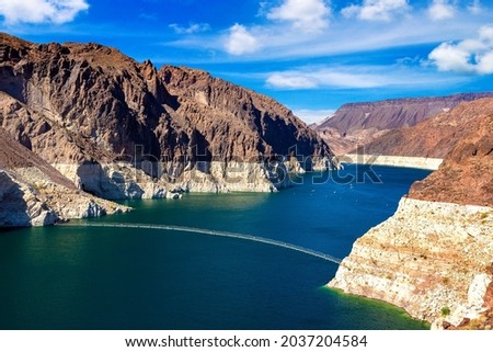 Colorado river. Low water level strip on cliff at lake Mead. View from Hoover Dam at Nevada and Arizona border, USA Royalty-Free Stock Photo #2037204584
