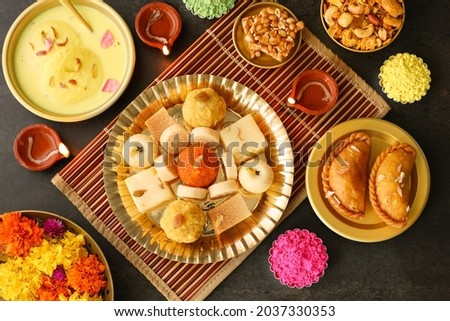 Diwali sweets Gujiya barfi Motichoor Laddu Rasmalai Indian sweet dessert mithai festival dish Dussehra Holi ganesh chaturthi Ram navami Durga puja durga ashtami Navratri Mumbai Kerala India Sri Lanka Royalty-Free Stock Photo #2037330353