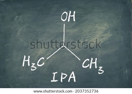 Chemical structure of Isopropyl alcohol (IPA) or 2-Propanol on Chalkboard background. It is used as a common ingredient in antiseptics, disinfectants, and detergents. Royalty-Free Stock Photo #2037352736