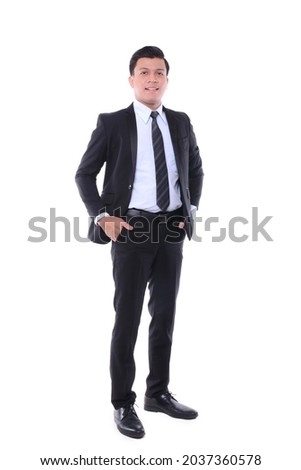 Portrait Of Asian Businessman On White Background. Business and office. Black suite