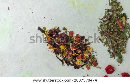 Top view photography of the flower, berry tea on the table.