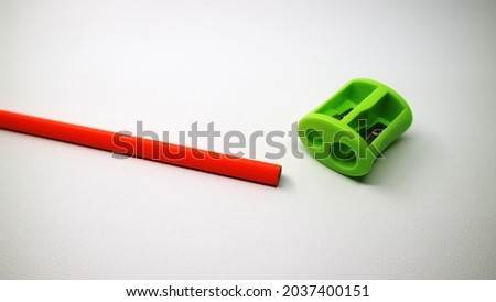Directly above view Of pencil With shavings on white background             