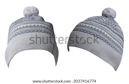 two knitted light gray blue graphite  hat isolated on white background.hat with pompon side view.