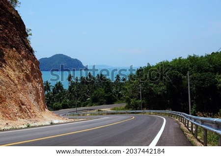 The Curve road with seaview                        Royalty-Free Stock Photo #2037442184