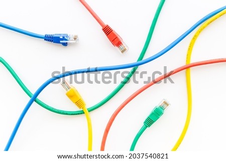 Multicolored computer cables and internet wires Royalty-Free Stock Photo #2037540821