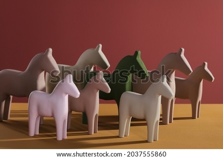 Colorfuhl decorative wooden horse with sadow on background
