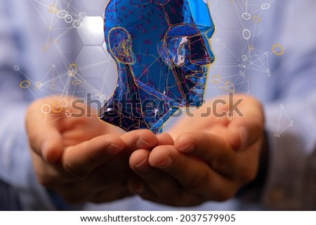 Hands holding an illustration of a human head- the concept of artificial intelligence
