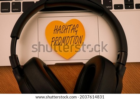 Inspiration showing sign Hashtag Promotion. Business approach more showing can discover and engage with your content Blank Notepad Laptop With Pen And Headphones Beside Cup Of Warm Coffee.
