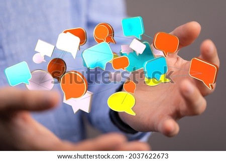 A closeup of 3d rendered communication paper speech bubbles in man's hands