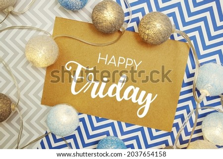 Happy Friday typography text on paper card with LED cotton balls decoration