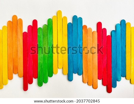 Popsicle Sticks in Multicolor design for Signal wave image on White background.