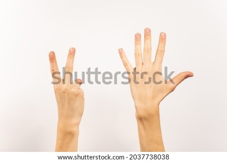 Hands making number sign, sign language, white background