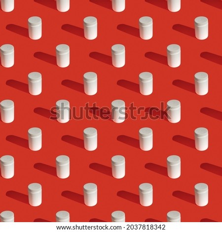 Seamless pattern made from medical pill jar on red background, Flat lay photo collage. Medecine, storage of medicines. Geomerty background. Seamless minimalistic isometric pattern