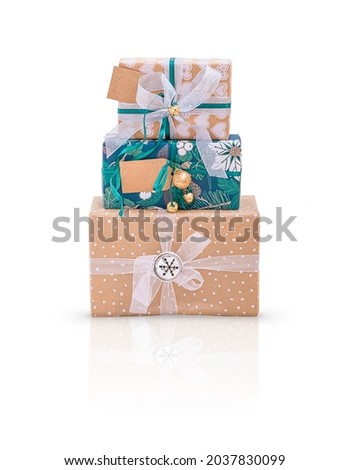Three Christmas gift boxes isolated on white background