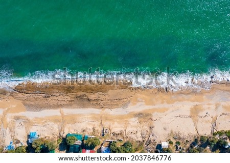 Top view of the sandy shore. Beach