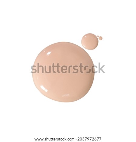 liquid makeup beige foundation Color BB CC cream or concealer smudge on white background. beauty and fashion concept Royalty-Free Stock Photo #2037972677
