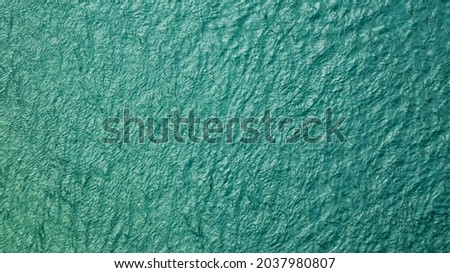 water surface from high angle a beautiful pattern  .Background watermark.close up ocean water background , blue water ripples texture.Clear water texture in blue. Background of the ocean .