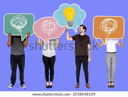 Creative man showing a light bulb symbol in a speech bubble