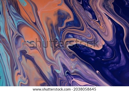 Beautiful liquid texture of the nail polish.Multicolored background with copy space.Fluid art,pour painting technique.Good as digital decor.