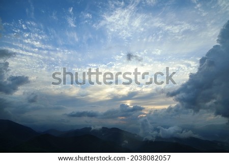 The sky and mountain range covered with clouds