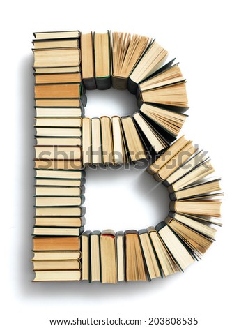 Letter B formed from the page ends of closed vintage hardcover books standing on a white background from a set or series of numbers